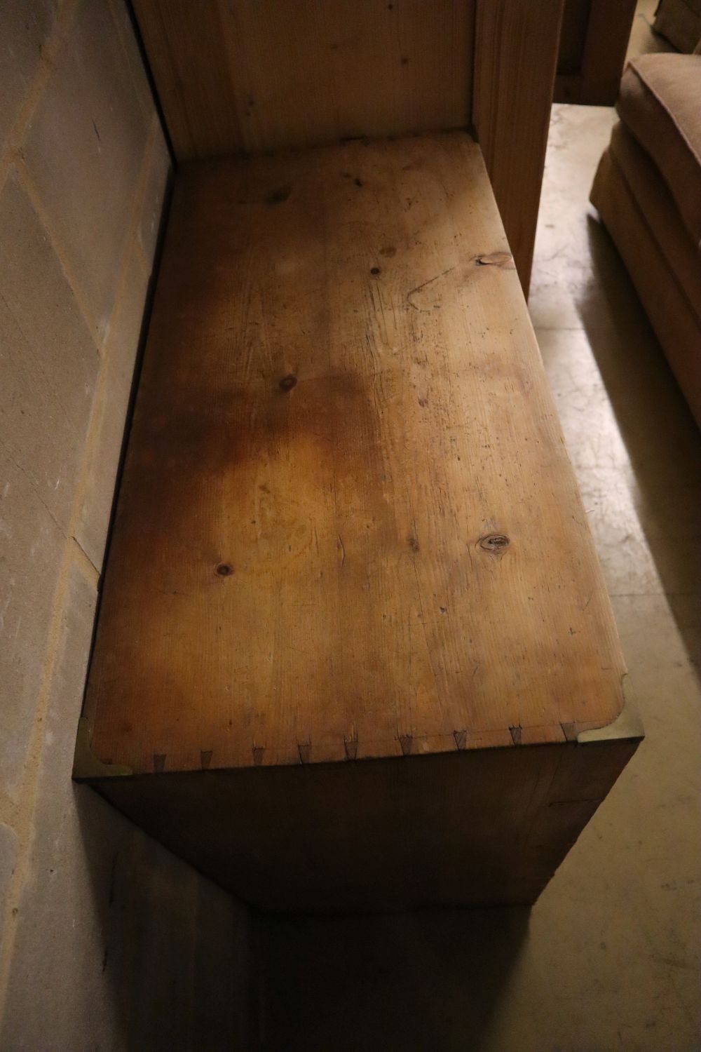 A Victorian pine chest of drawers having later brass mounts, width 90cm depth 44cm height 88cm